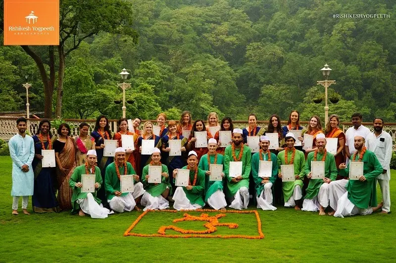 Graduation group photo on the lawn at Abhayaranya Yoga Ashram