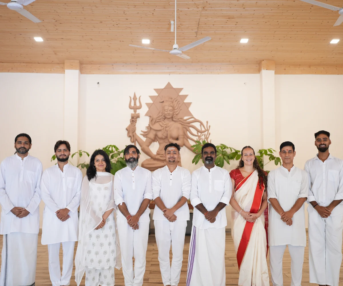 Faculty portrait on yogashala steps