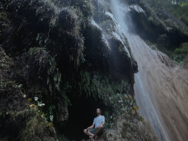 A waterfall in the forest on the trail near the ashram above Rishikesh